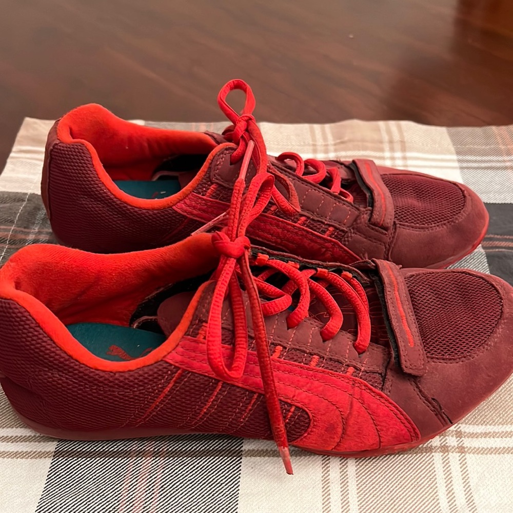 Red and maroon women’s puma shoes